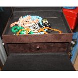 Three boxes of costume jewellery and watches to include an amber bead necklace, 53.6g