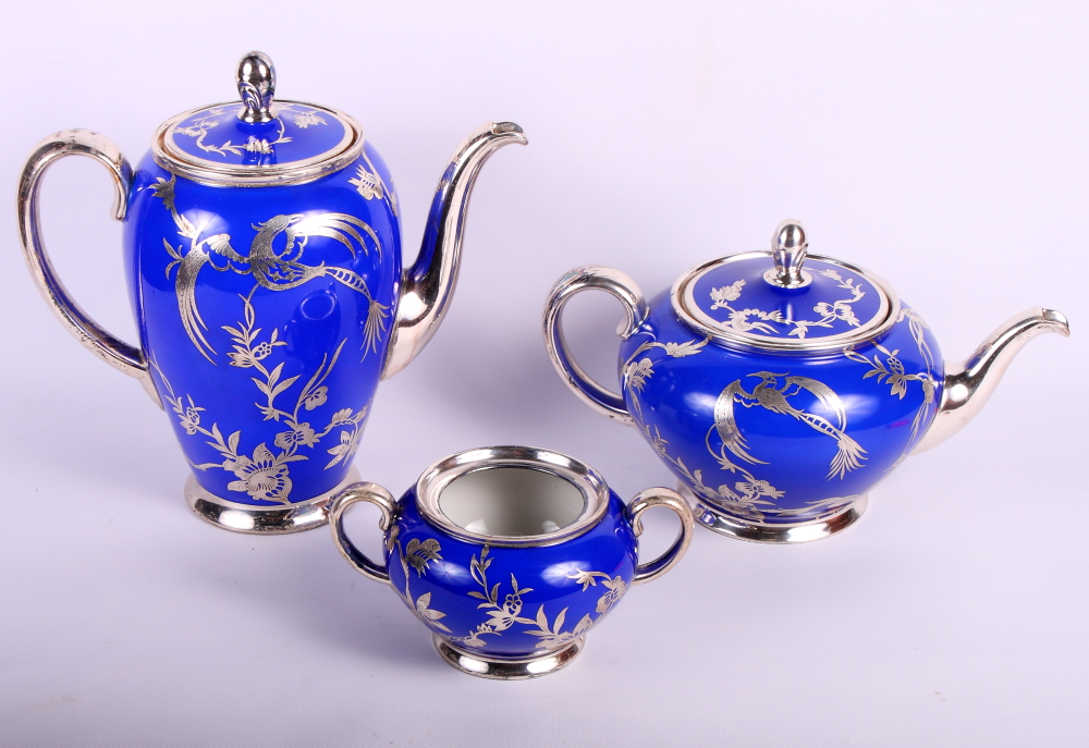 A Rosenthal Aida pattern part teaset comprising teapot, coffee pot and sucrier (lacking lid)