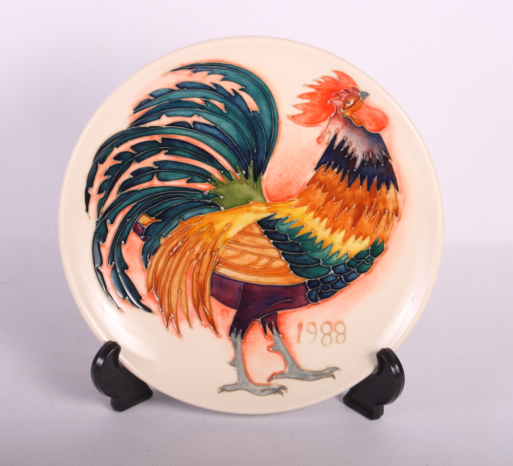 A Moorcroft limited edition 1988 Christmas plate decorated a cockerel, 27/250, 9" dia