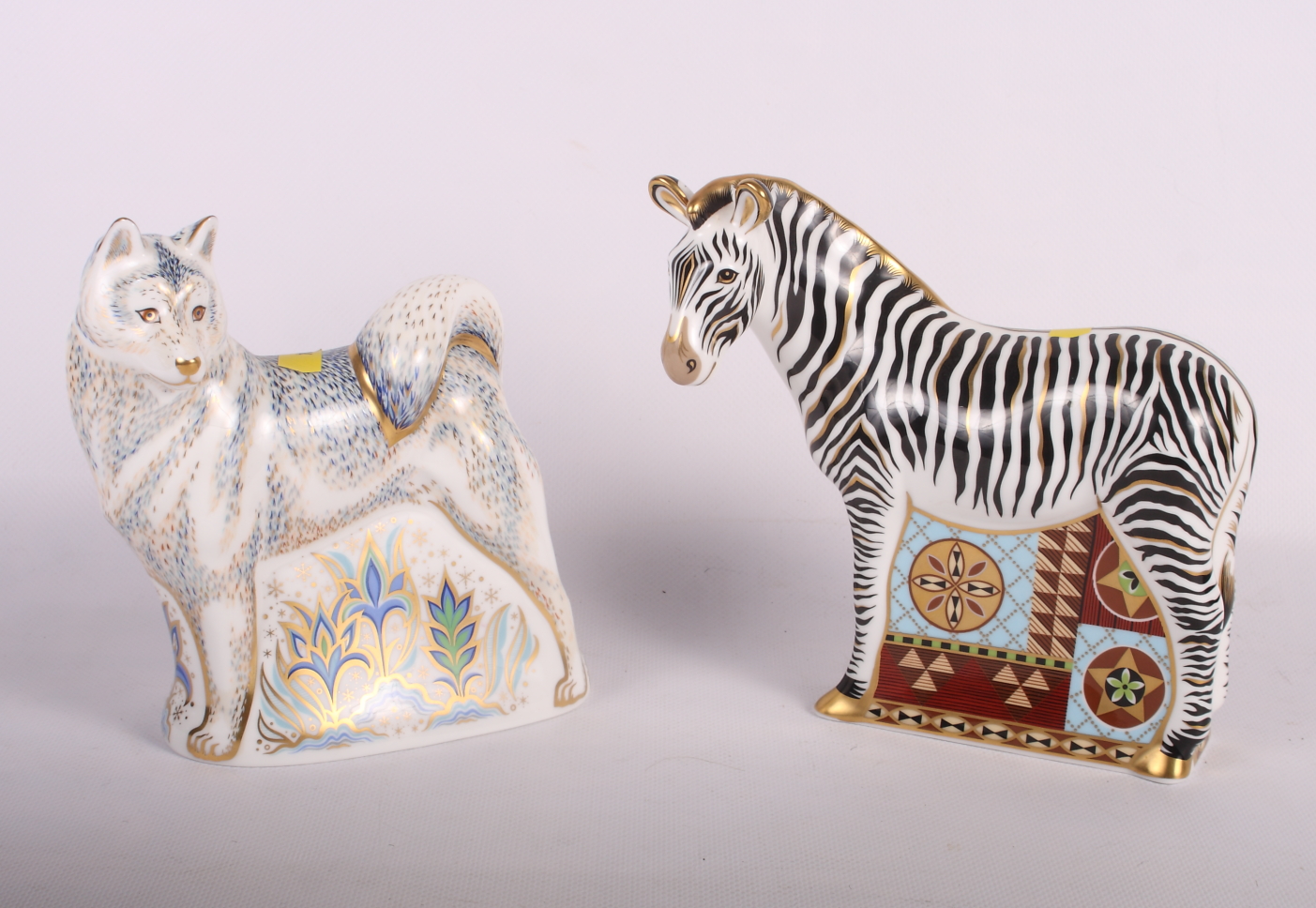 Two Royal Crown Derby gold stopper paperweights, Zebra and Husky