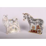 Two Royal Crown Derby gold stopper paperweights, Zebra and Husky