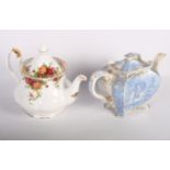 A Royal Albert "Old Country Roses" china teapot, a Wedgwood "Turquoise Florentine" teapot and