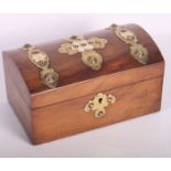 A Victorian dome top two-compartment tea caddy with decorative brass mounts