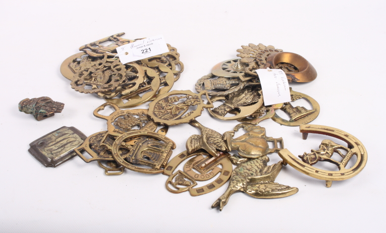A collection of horse brasses, various
