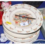 Nine Royal Doulton "Bunnykins" side plates, 8" dia, a similar feeding bowl and a teaching clock