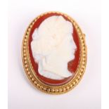 A 15ct gold mounted carved hardstone cameo brooch
