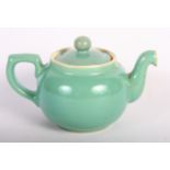 A Denby stoneware part dinner service in green and a Worcester "Evesham" teapot with side spout