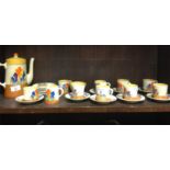 A 1930s Clarice Cliff Crocus design coffee set comprising nine cups, fifteen saucers, milk jug and