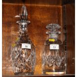 A Stuart crystal decanter and one other, largest 11 3/4" high