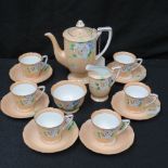A Noritake tea set: a tea pot; six teacups with and saucers; a sugar bowl and milk jug;