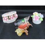 A Royal Doulton miniature posey of flowers (4cm high);