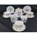 A vintage circa 1950s children's tea set decorated nursery rhyme characters: a hexagonal form tea