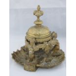 A Continental late 19th century brass ink stand decorated with shells and sphinxes,