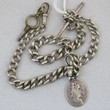 A graduated silver double Albert chain with St Christopher pendant and key attached,
