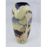 A Moorcroft vase with Winter landscape design, 20cm high.