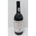 A bottle of Grahams 1977 vintage port in Berry Bros and Rudd bag