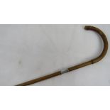 A vintage Charlie Chaplin-type walking cane having HM silver collar