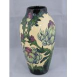 A Moorcroft limited edition vase with Garden castle design, number 52 of 75, 21cm high.