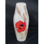 A Moorcroft vase with Poppy design,