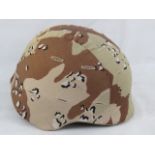 A US army Gulf War first issue helmet wi