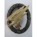 A very fine reproduction Nazi Army Paratrooper badge; reverse stamped "G.H.