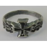 A reproduction Nazi Iron Cross ring in white metal.