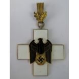 A very fine reproduction Nazi Red Cross, Grand Cross enamel badge; 5cm wide.