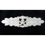 A reproduction WW2 Nazi Army Close combat clasp in white metal; reverse stamped "F&B.L."; 9.