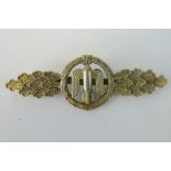 A Nazi Luftwaffe Short Range Night fighter clasp; reverse stamped "F&B L"; 7.5cm long.