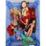 Ten dolls including three Disney Ariel figures and others.