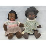 A rubberised and seated black doll having sleepy eyes, unmarked. 31cm in length.