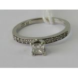 A 10ct white gold and diamond ring, cent