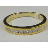 A 9ct gold and diamond ring, nine round