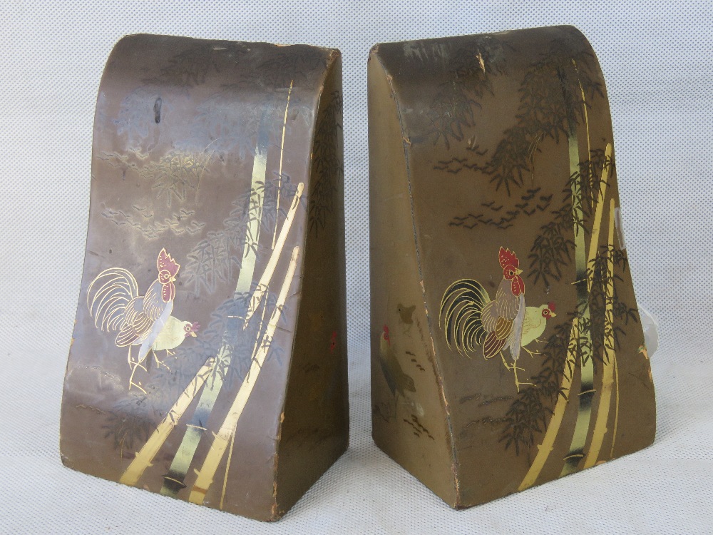 A pair of Japanese wooden book ends, 20c