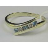 A 9ct white gold aquamarine and diamond