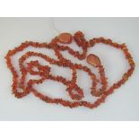 A long strand of carnelian chips termina