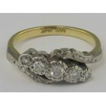 An 18ct gold, platinum and diamond ring,