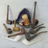 A collection of pipes: two clay, seven w