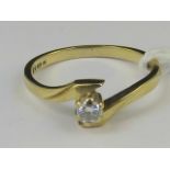 A 9ct gold diamond solitaire, twist desi