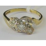 A 9ct gold and diamond ring, three diamo