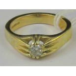 An 18ct gold and diamond ring, claw set