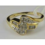 A 10ct gold and diamond ring. Three rows