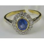 An 18ct gold sapphire and diamond ring.