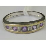 An amethyst and diamond ring, five ameth