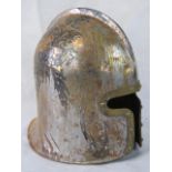 A reproduction medieval jousting helmet