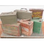 Six oil/petrol/diesel tins in various co