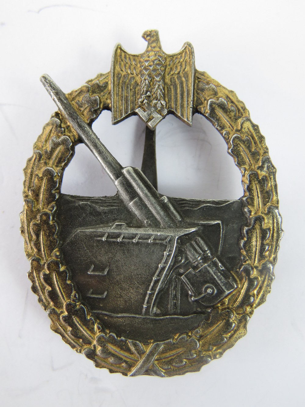 A WW2 Nazi Coastal Artillery badge; 5cm