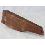 A wooden broom handle Mauser carry case