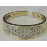 A 9ct gold and diamond ring, three rows