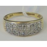 A 9ct gold and diamond ring, three rows